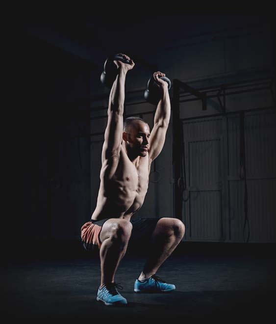 Athlete doing a kettlebell workout